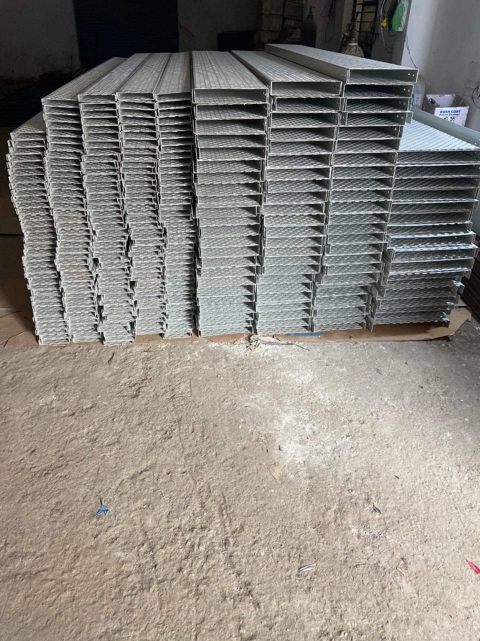 Batch of finished perforated cable trays ready for dispatch