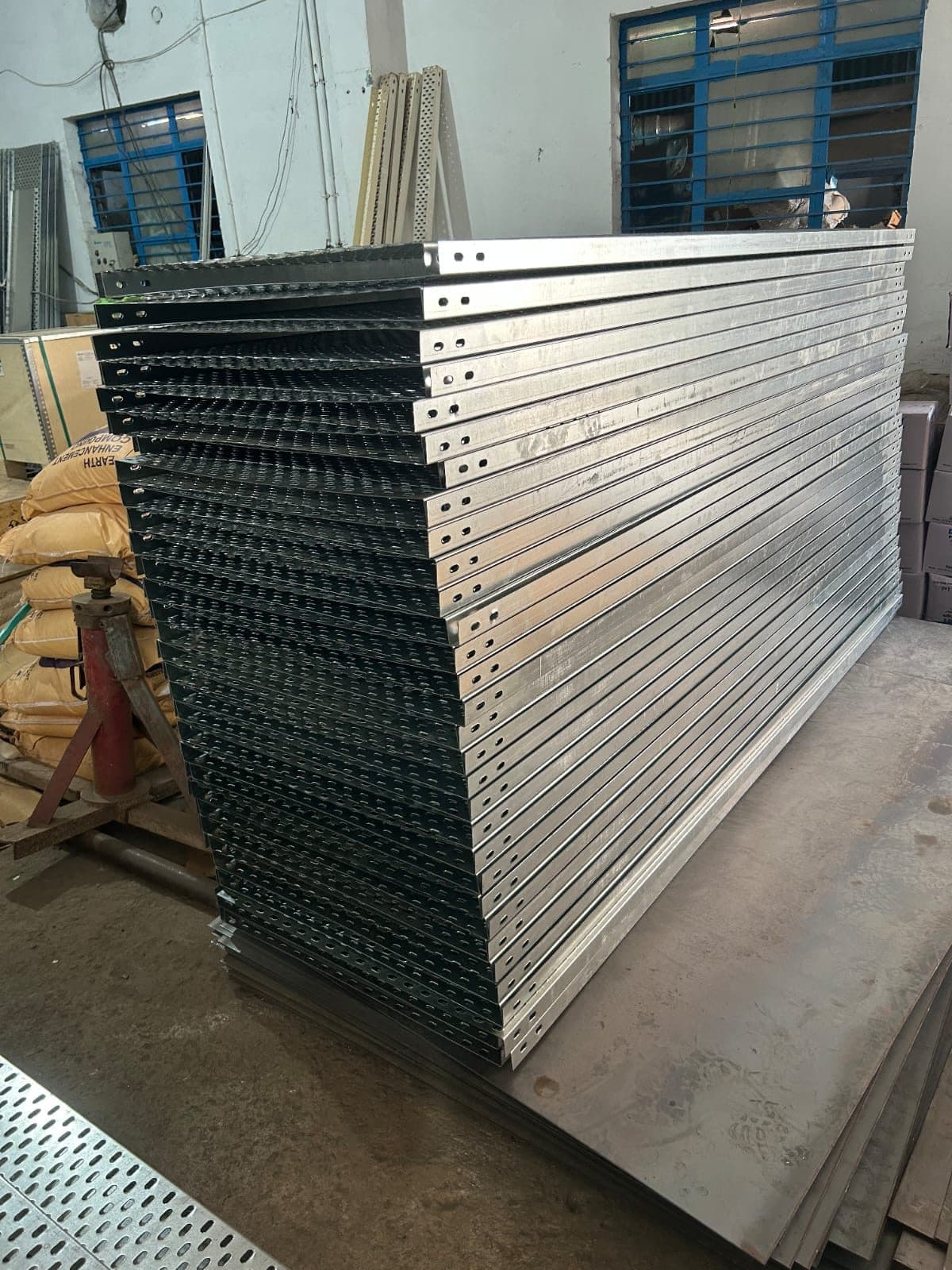 Stack of galvanised perforated cable trays