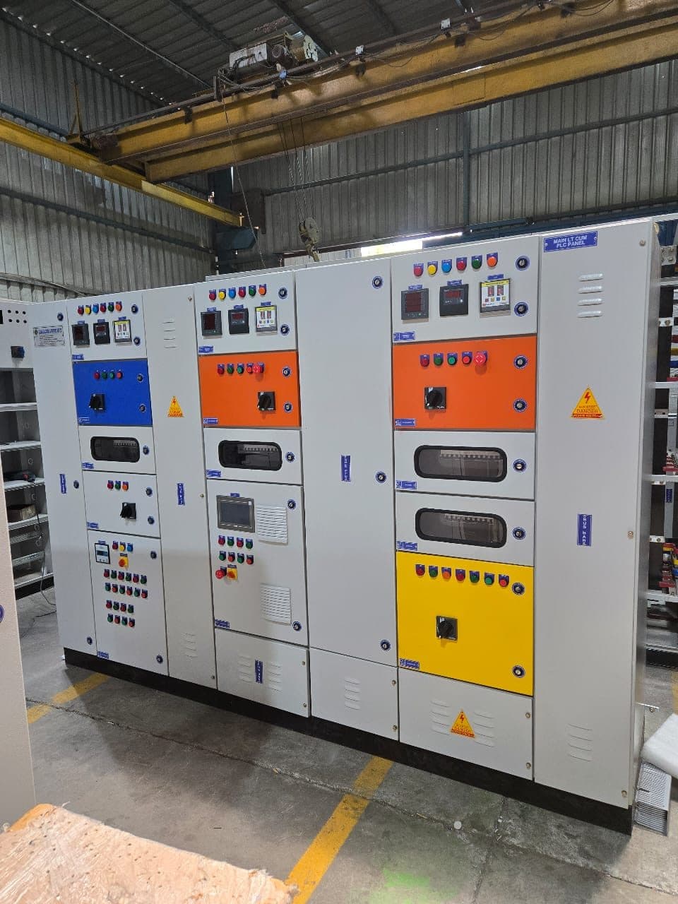 Panels with blue, orange and yellow incomer sections