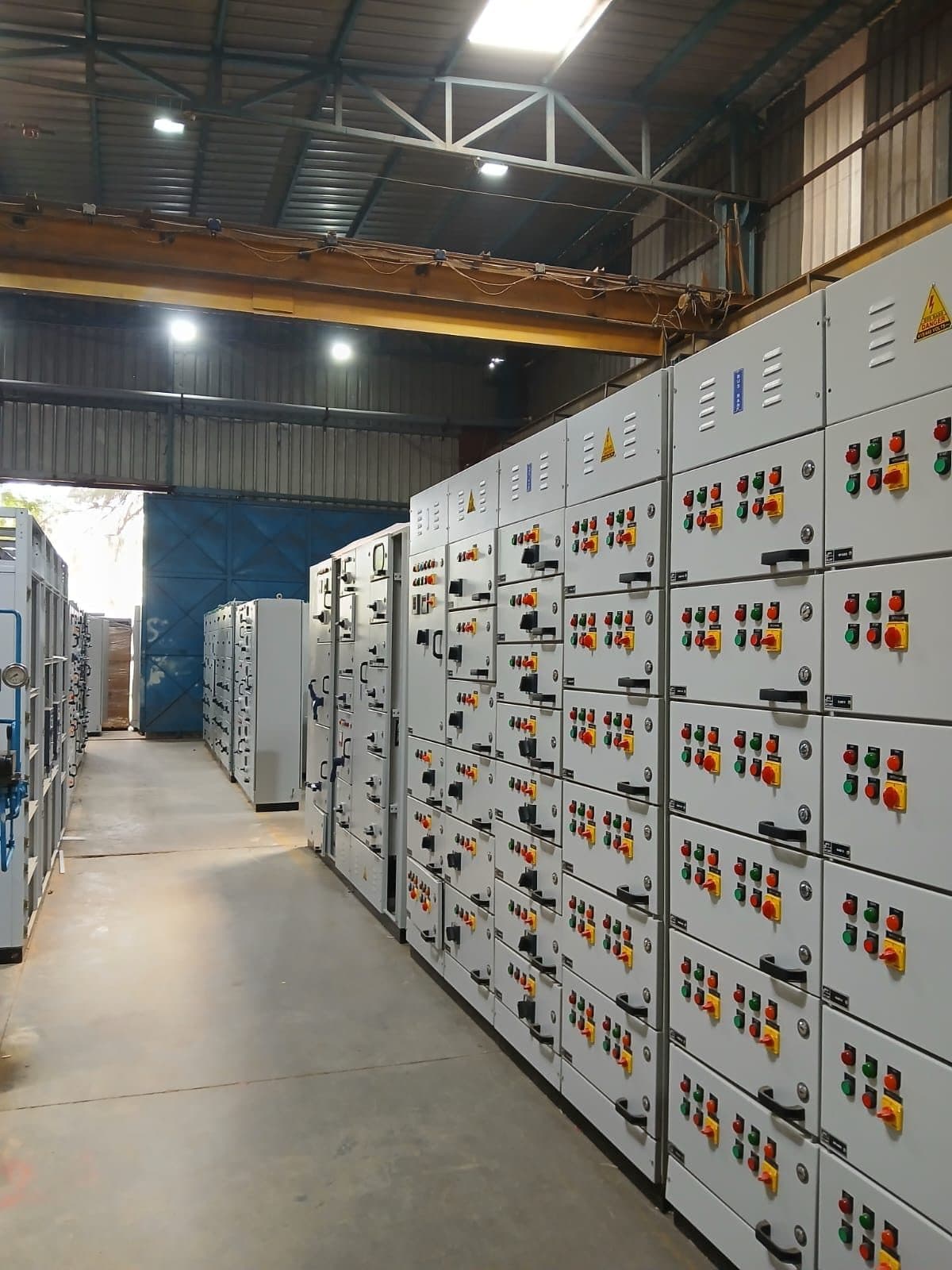 Aisle between long rows of finished MCC panels