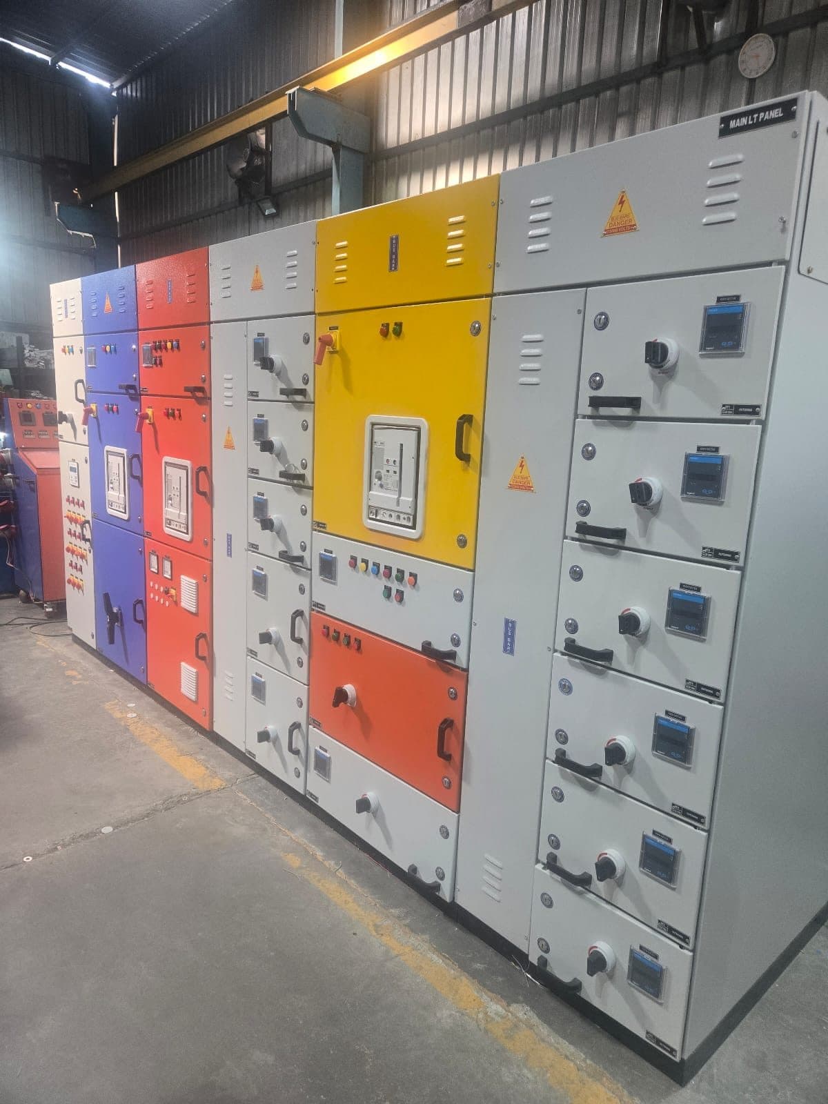 PCC panels with red, blue, yellow and orange incomer doors