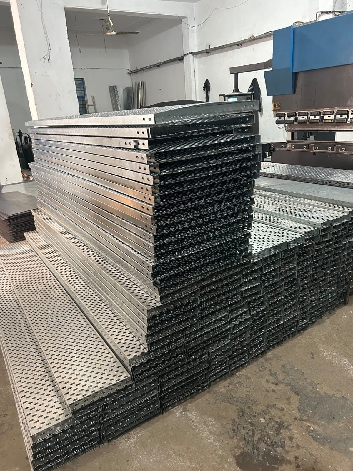 Stacks of galvanised perforated cable trays at the Trident plant